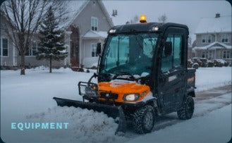 Snow removal equipment in front of a house