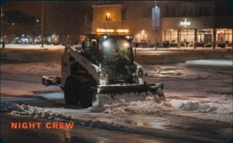 Night crew clearing snow